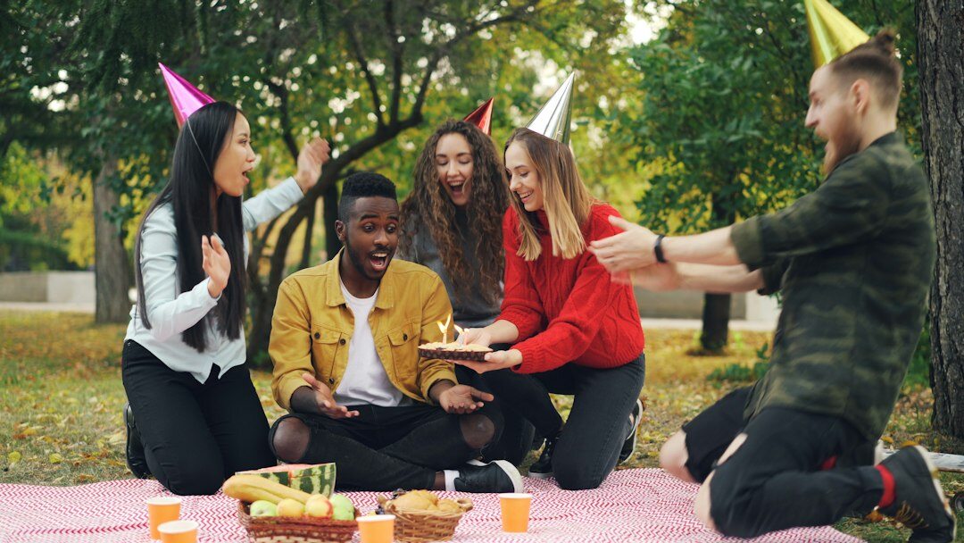 Diverse group of colleagues celebrating outdoors