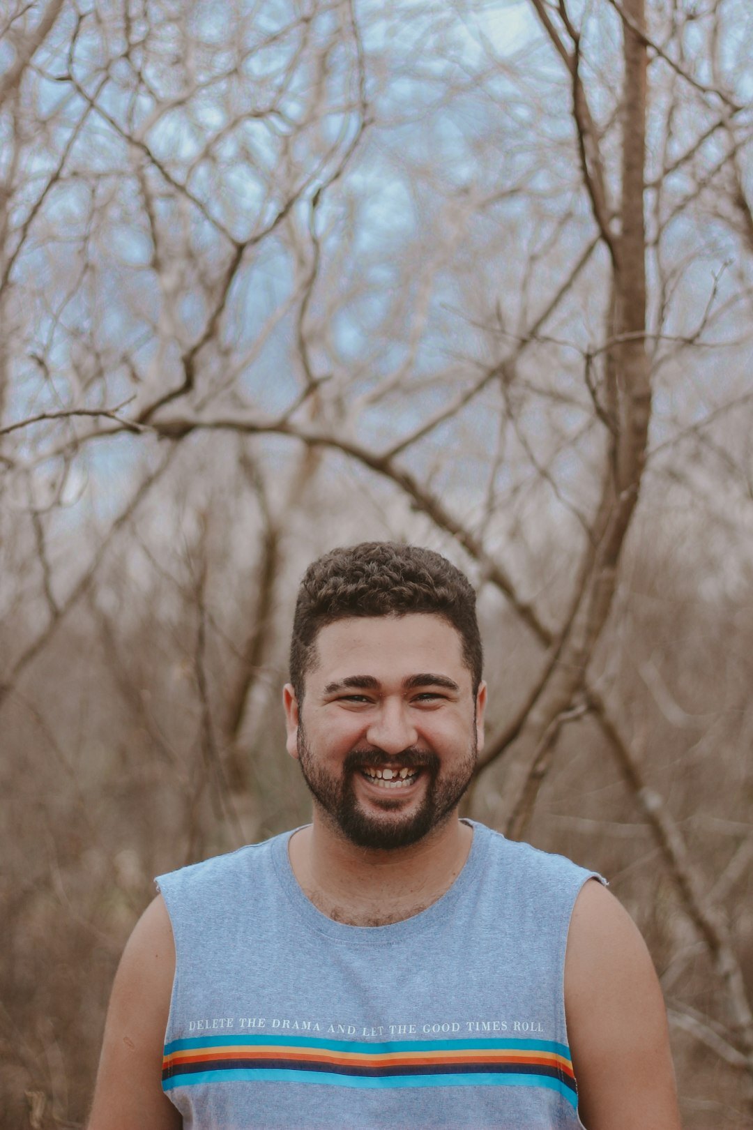 Portrait of a man with a short beard smiling