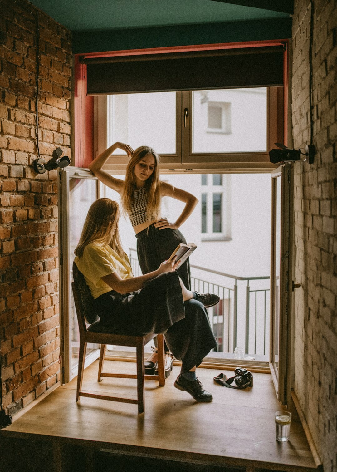 Two women reviewing a document together at a laptop